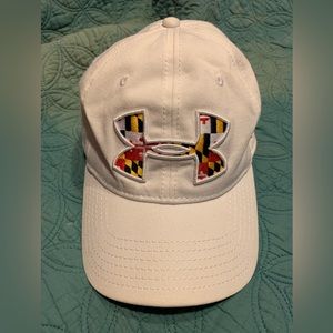 Under Armour White Cap. Adjustable strap in back of cap. Embroidered emblem